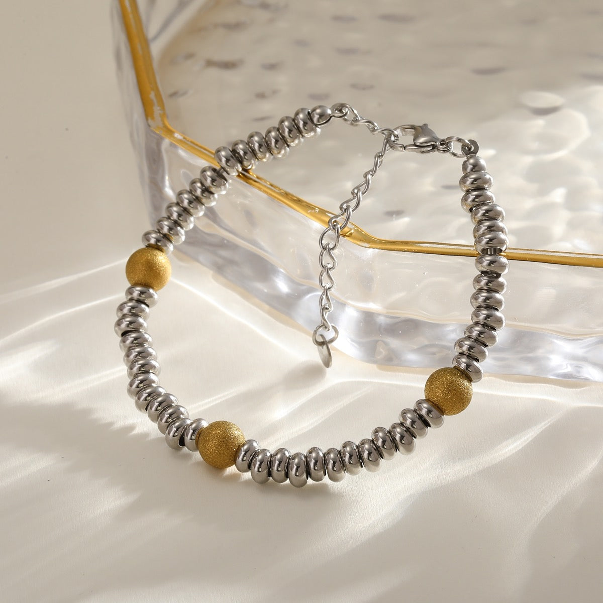 Pulsera doble tono bolitas