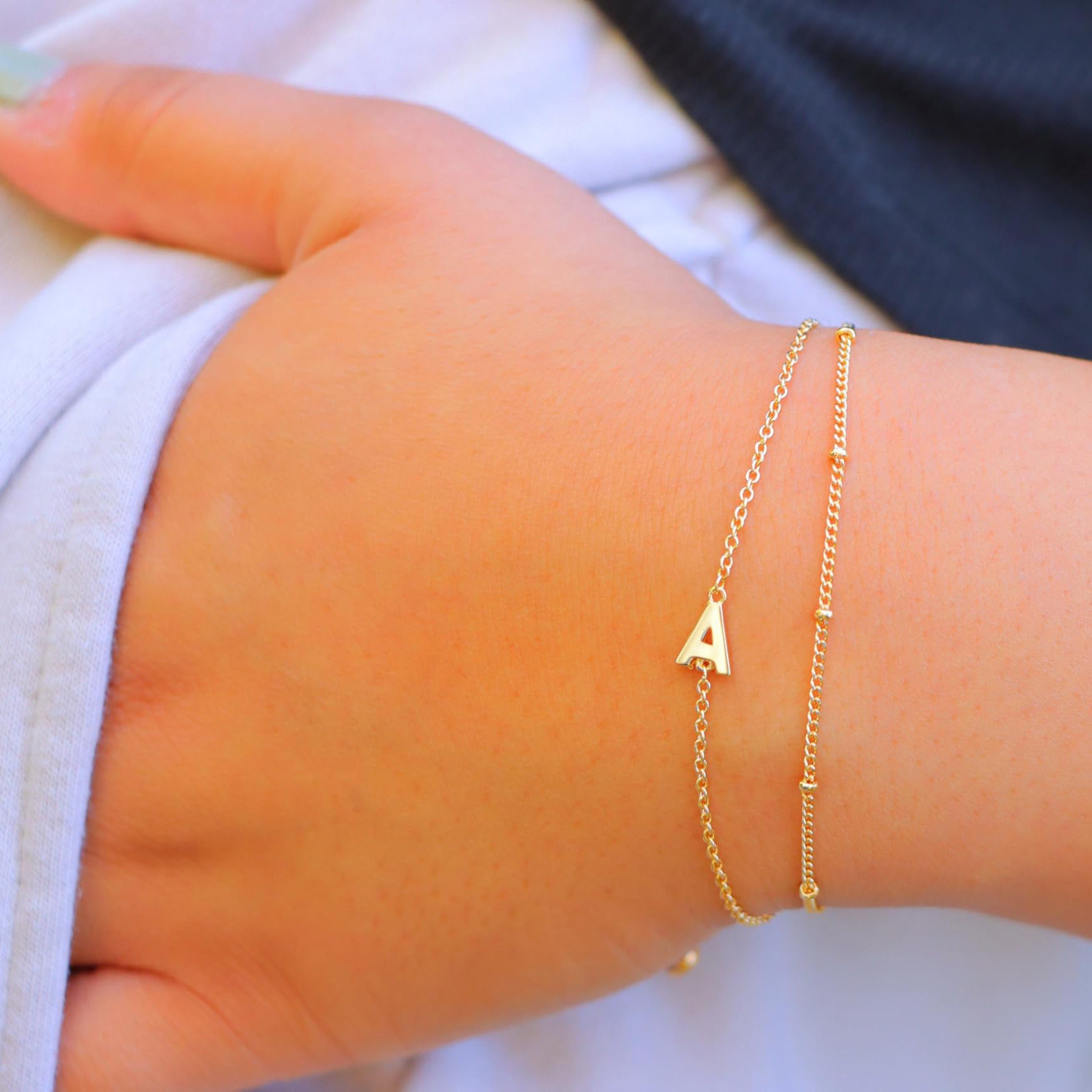 Pulsera doble letra